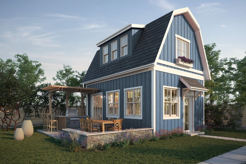 Architect reviewing backyard housing plans for building a second home on a residential property