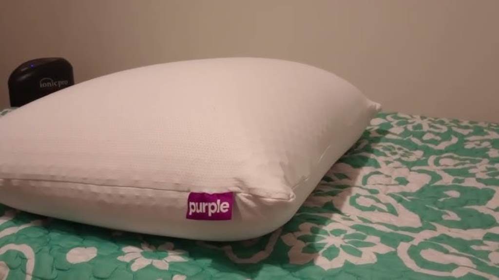 Purple Harmony Pillow in use, demonstrating neck alignment for side sleepers