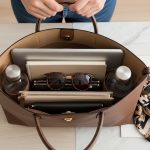 Professional leather large luxury tote bag carrying laptop and documents