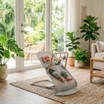 Breathable baby bouncer set up in a sunlit Florida living room.